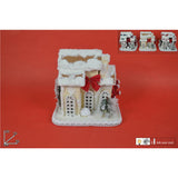 immagine-1-due-esse-christmas-casetta-innevata-con-luci-e-suoni-20cm-assortita-ean-8033113791758